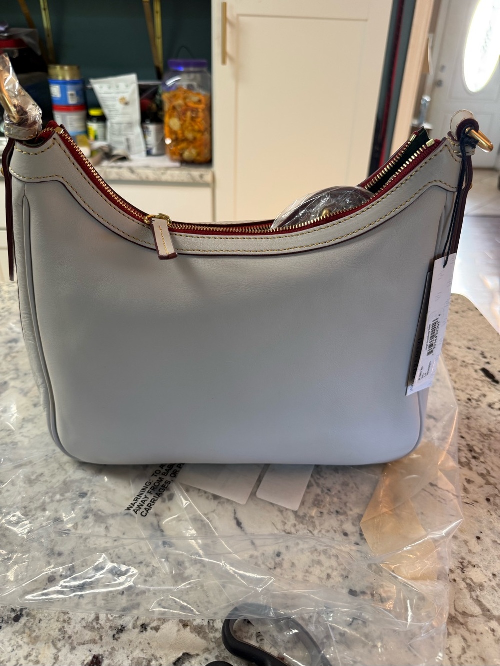 Dooney and Bourke Ecru Florentine Leather crossbody hobo large bag